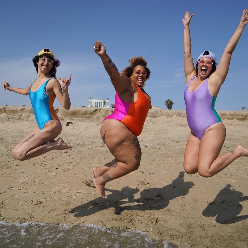 Moxi roller skates swimsuit in XS blue/gold two toned one piece